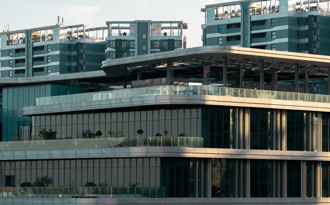 Modern buildings with glass and concrete facade.
