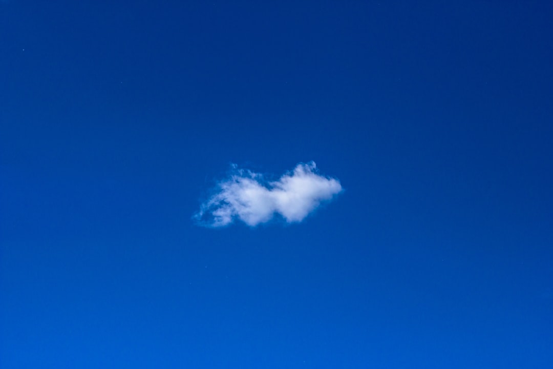 white cloud under clear sky