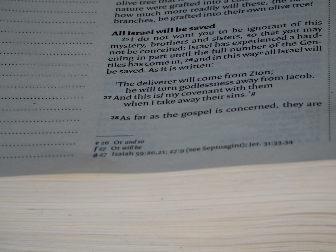 A close up of a book with a page in it