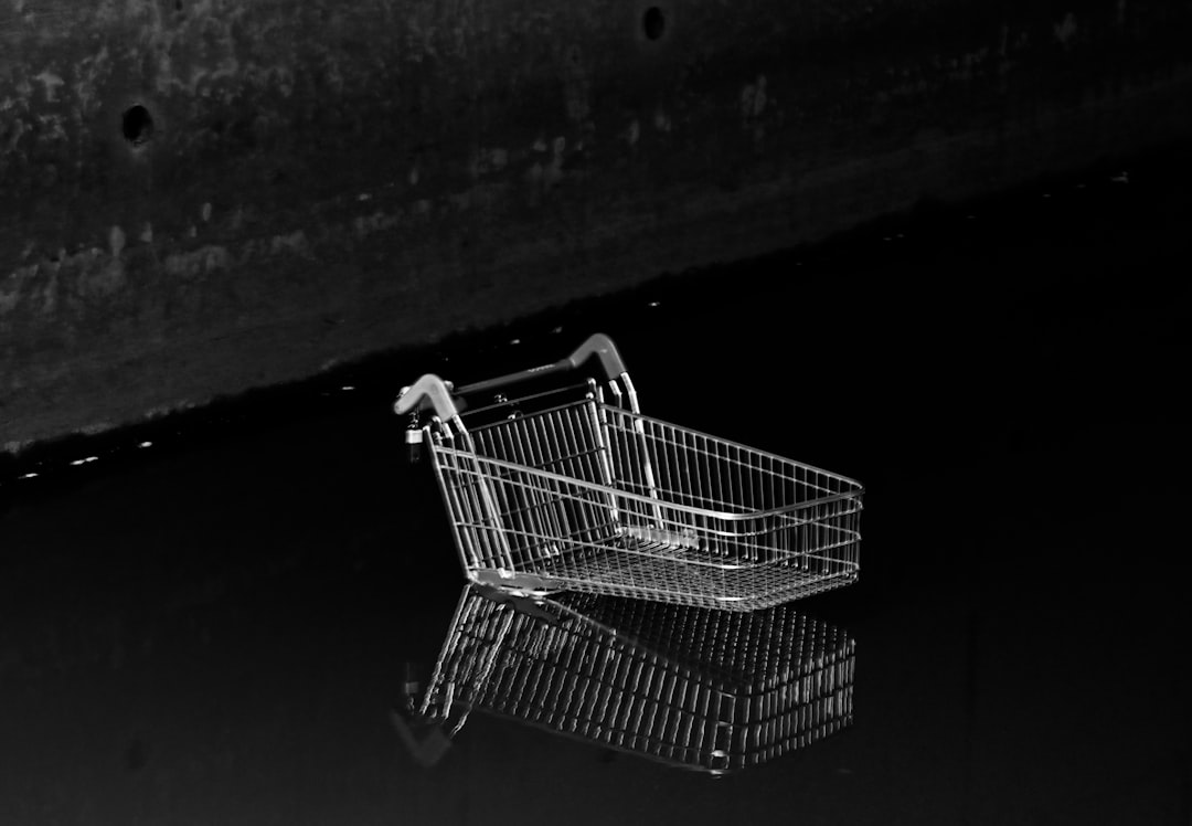 a shopping cart on a black background