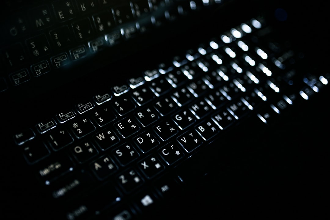 a close up of a keyboard in the dark