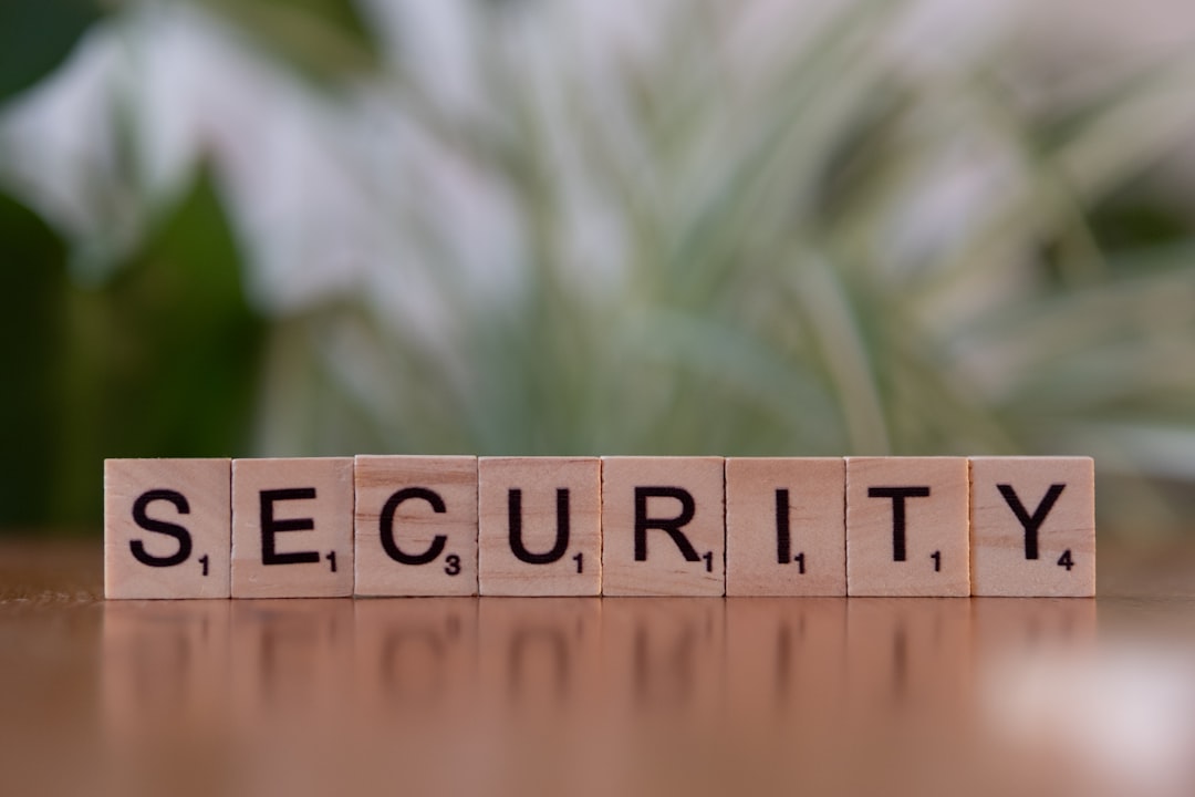 A wooden block spelling security on a table